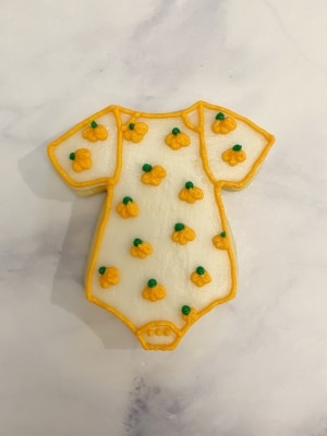 a little pumpkin is on the way baby shower cookie