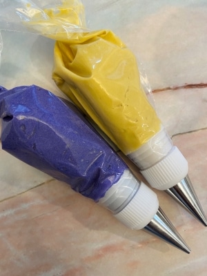 purple and gold buttercream frosting