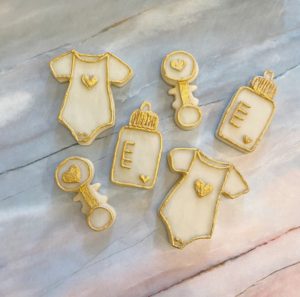 white and gold baby shower cookies