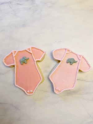 how to decorate pink elephant onesie cookies