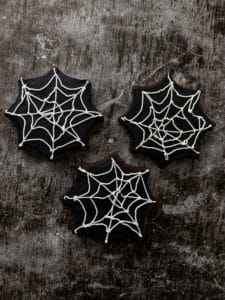 Halloween spider web cookies with buttercream frosting