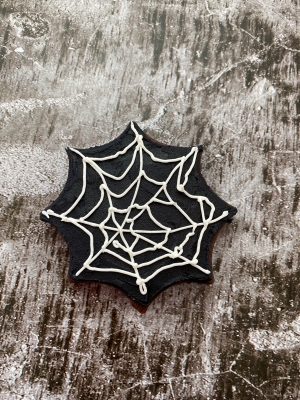 spider web cookies for Halloween made with buttercream frosting