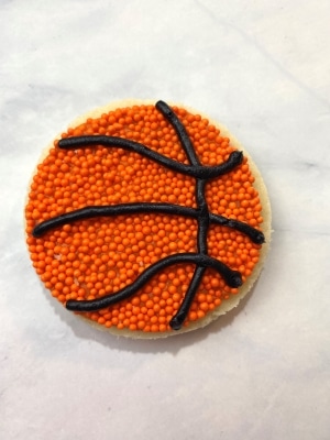 decorate basketball cookies with buttercream frosting