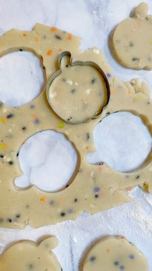 cut out sprinkle sugar cookie dough